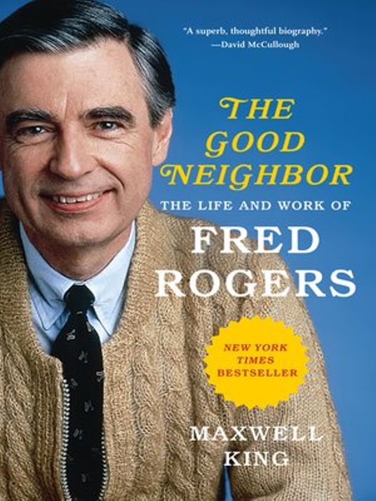 Cover Image: 'The Good Neighbor'. White man with grey hair is smiling and wearing a shirt, tie, and sweater.